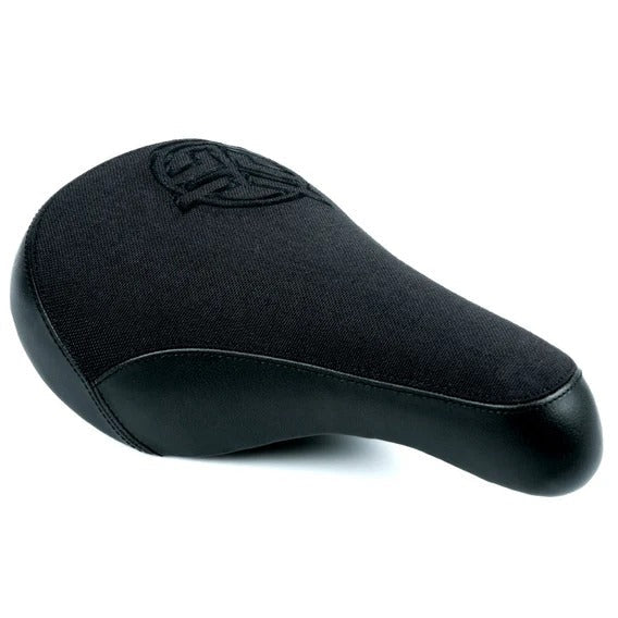 The Federal Mid Stealth Logo Seat in black features a canvas top, faux leather panels on the sides, and black embroidered detailing, displayed against a white background.