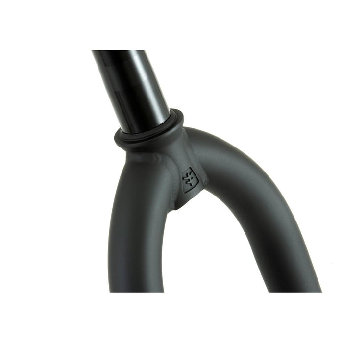 Close-up of a black Fly Bikes 18 Inch Volcano Fork featuring the steerer tube and fork crown, with an embossed logo. Rest assured with a lifetime warranty on this essential component of the Fly Bikes 18” complete bike.