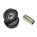 Two black sealed ball bearings labeled "ESM BIKES" are stacked next to a metallic spacer on a white background—key components of the S&M USA Bottom Bracket Set for American BB setups or BMX bottom brackets.