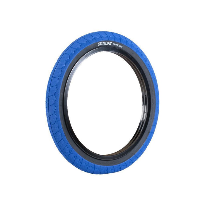 The Sunday Current V2 20 Inch Tyre (Each) is shown in blue with black sidewalls and “SUNDAY 20x2.4” printed on the tread, displayed upright against a white background. Ideal for beginner riders, this budget-friendly tire features a grippy tread pattern designed to provide enhanced confidence and control.